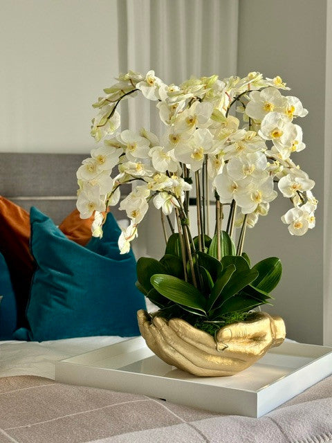 White Phalaenopsis Orchids in Gold Open Hands Sculpture Vase