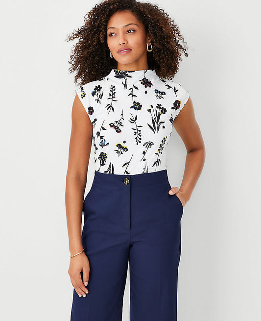 Haut à col montant raffiné extensible à motif floral
