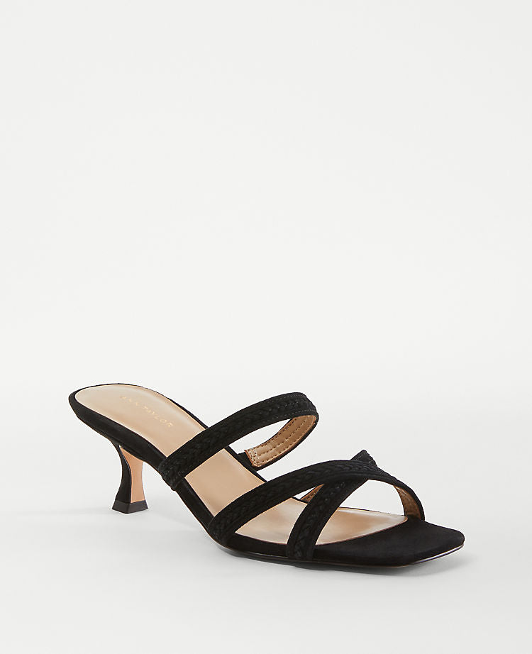 Sandales mules en cuir tressé à brides