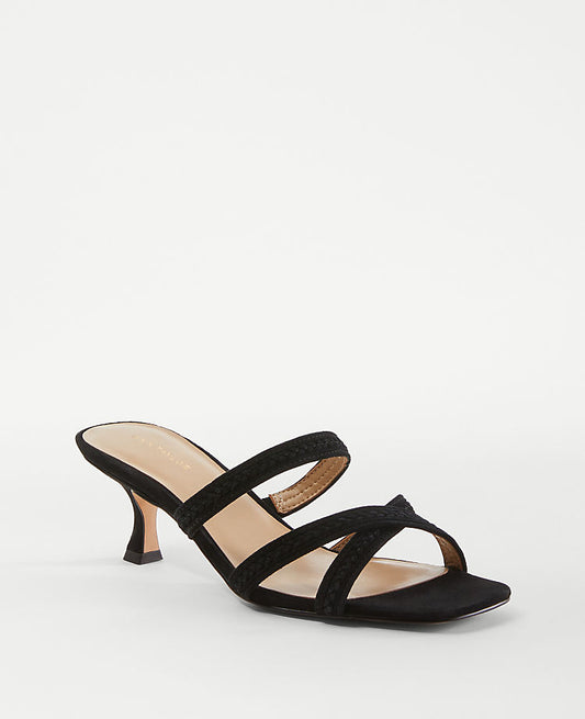 Sandales mules en cuir tressé à brides
