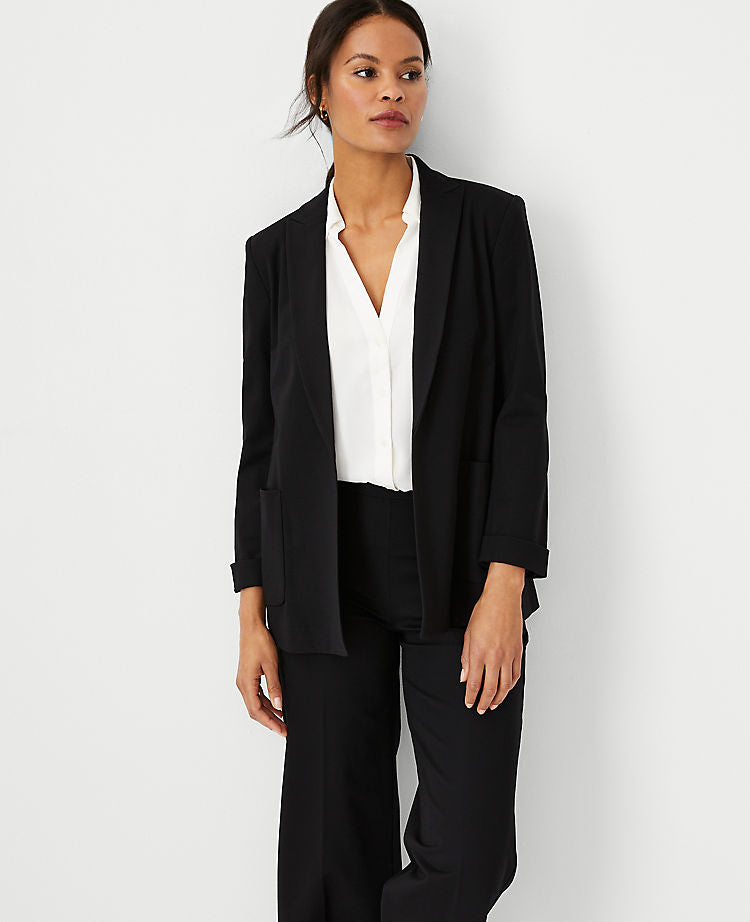 Le blazer long en maille à revers