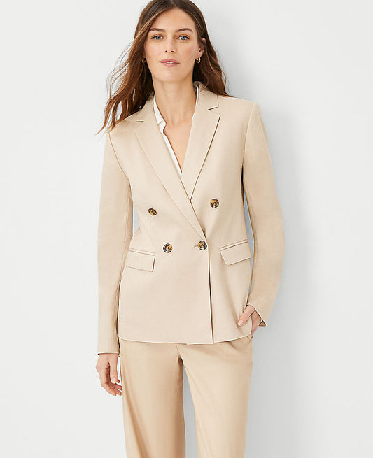 Le long blazer croisé en mélange de lin chevrons