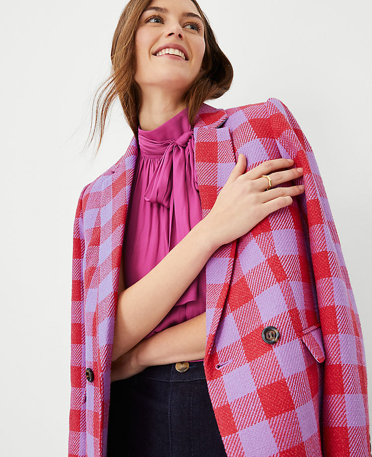 Le long blazer croisé à carreaux