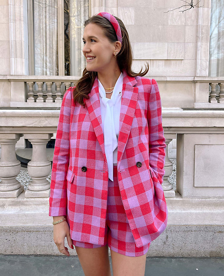 Le long blazer croisé à carreaux