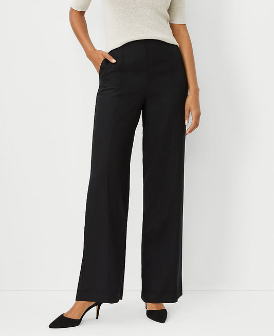 Le pantalon droit à fermeture éclair latérale et couture apparente - Coupe galbée