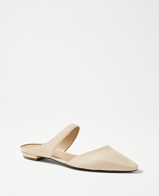 Mules plates en cuir