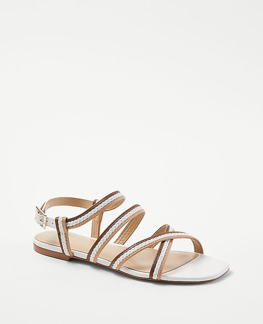 Sandales plates en cuir tressé à brides