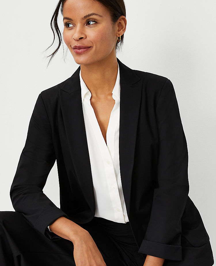 Le blazer long en maille à revers