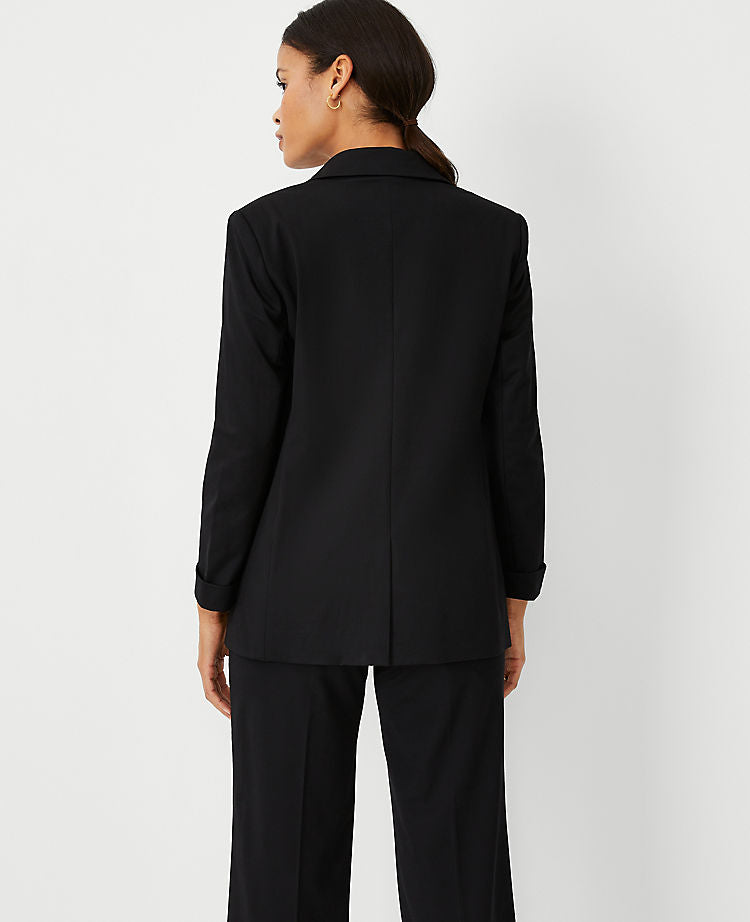 Le blazer long en maille à revers