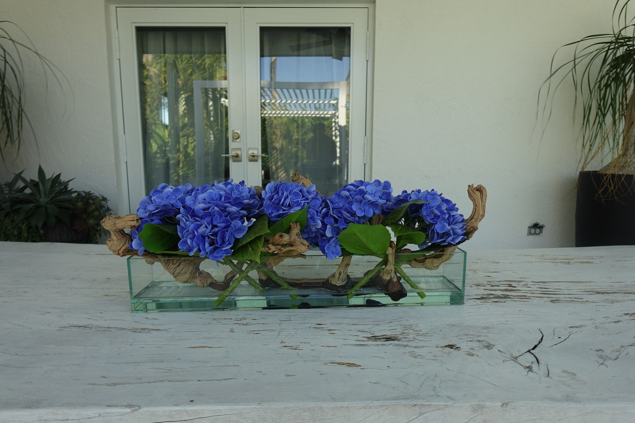 Jardinière en verre moderne Casa avec hortensias et bois flotté