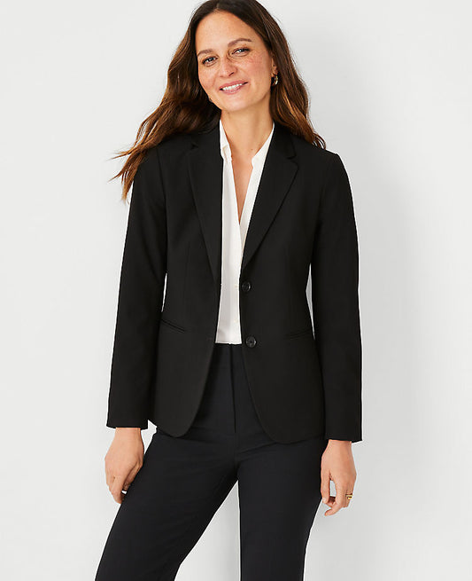 Le blazer long à deux boutons en tissu extensible tout temps
