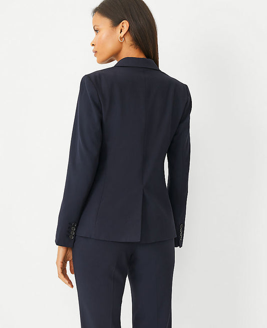Le blazer long à deux boutons en tissu extensible tout temps
