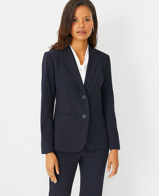 Le blazer long à deux boutons en tissu extensible tout temps