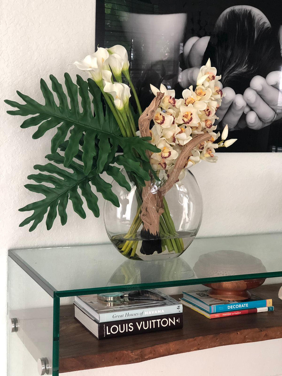 Moon vase with cymbidiums and callas
