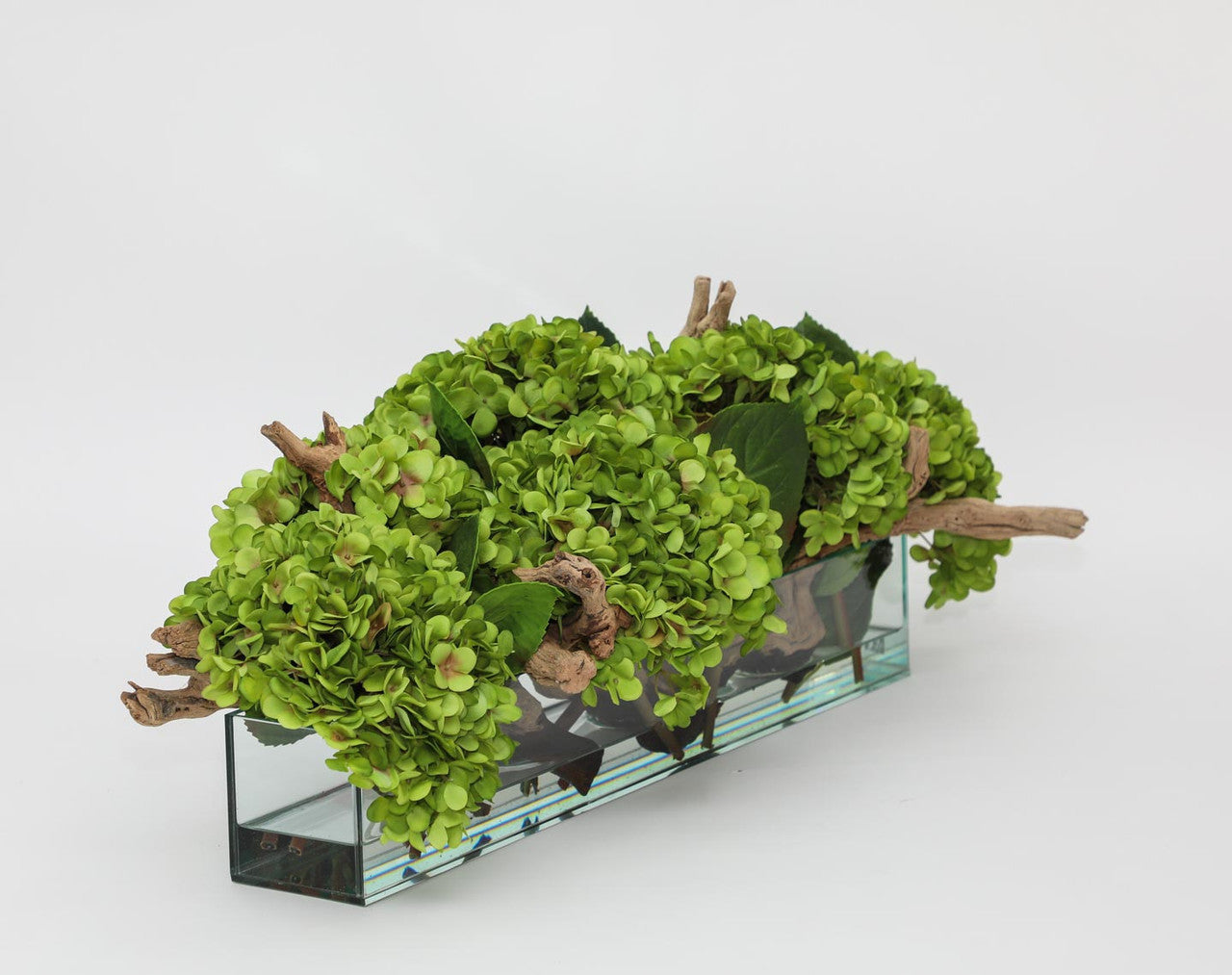 Jardinière en verre moderne Casa avec hortensias et bois flotté