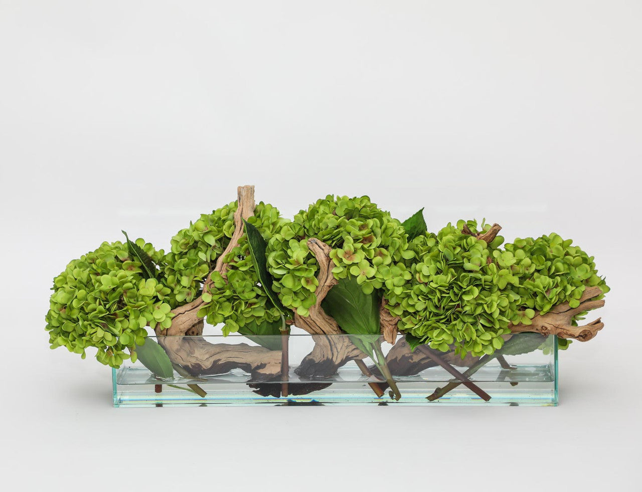 Jardinière en verre moderne Casa avec hortensias et bois flotté