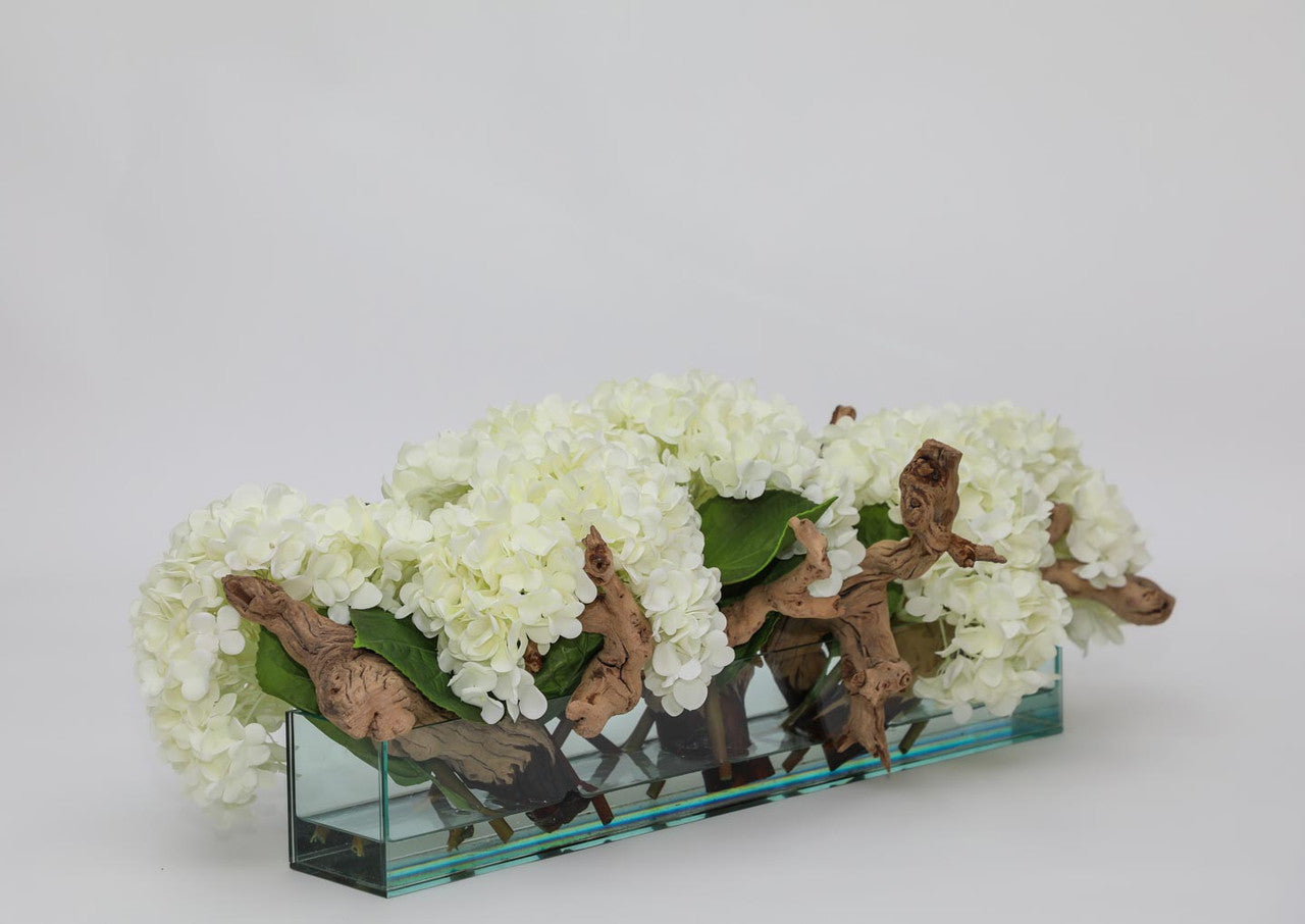 Jardinière en verre moderne Casa avec hortensias et bois flotté